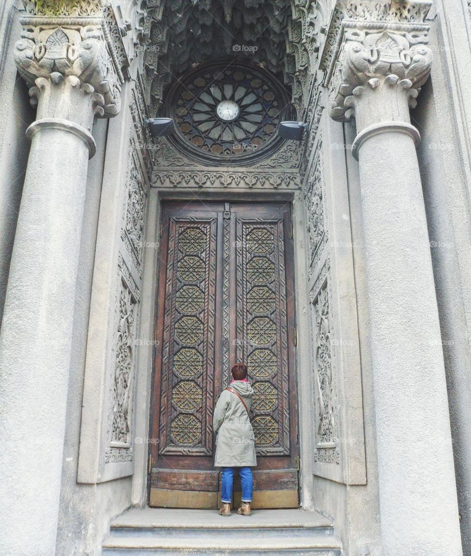 girl at the big door