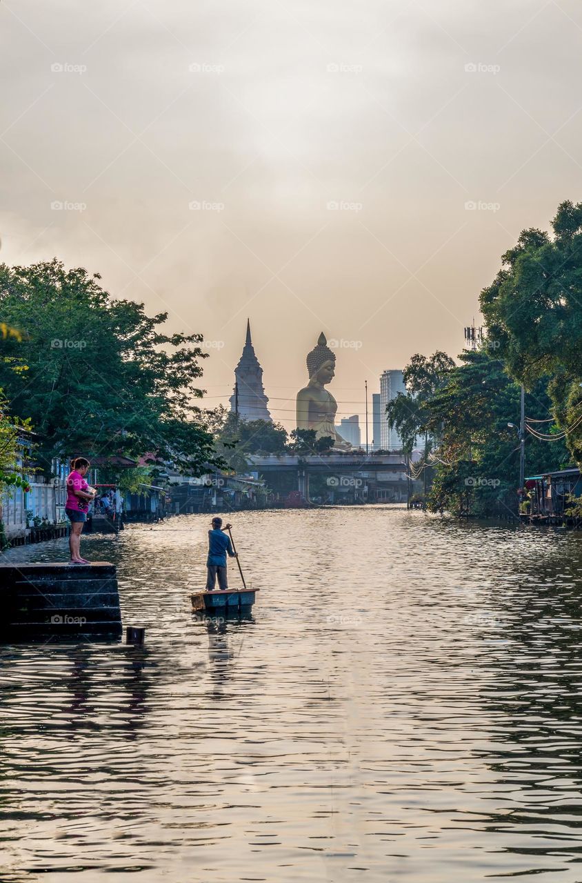 Big Buddha and reflection in river