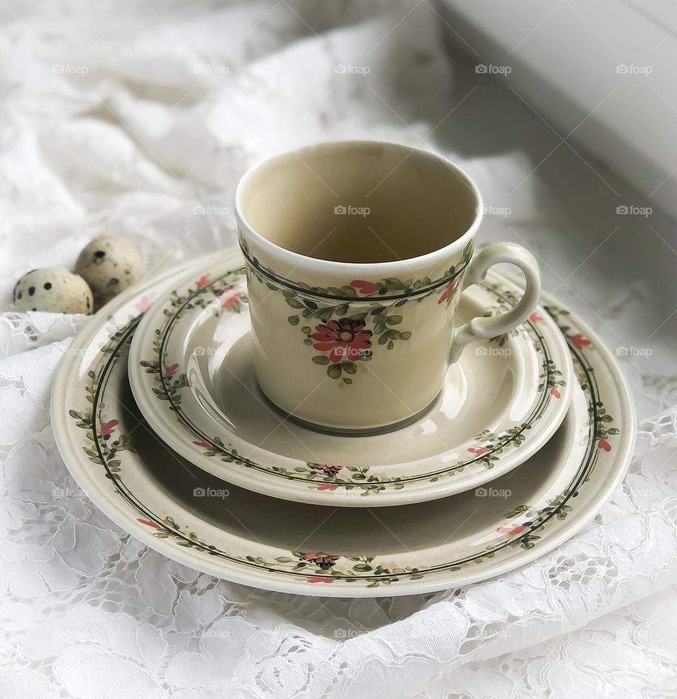 Antique table set in olive color with salmon ornaments 