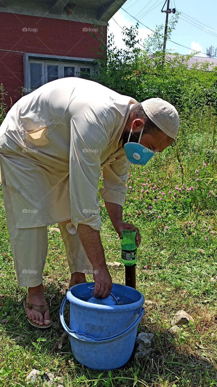 Manual Watering of  Earthing points/ Holes in  33kv  Yard  of  33kv / 11kv - 2*6.3MVA Receiving Station  Gagren (Shopian  Kashmir J&K India.) for efficient /Quick / responsive tripping on 11KV Fault occurence....