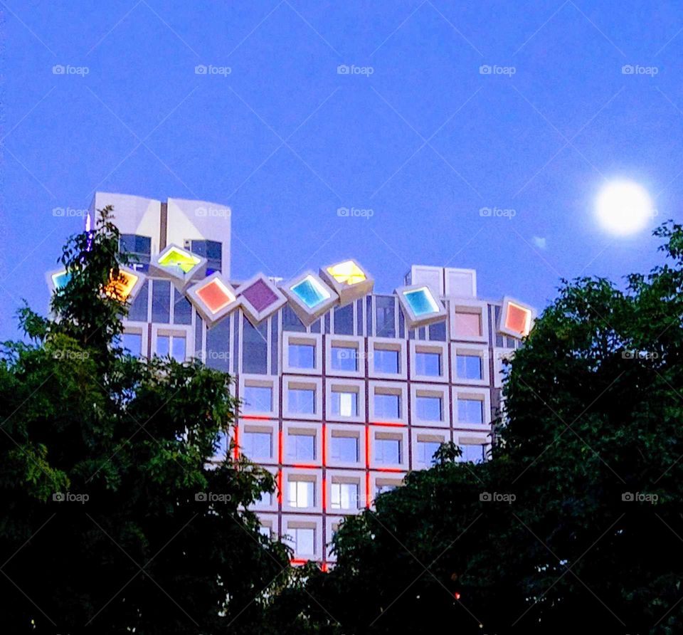 Sunrises, sunsets & the moon: the  full moon accompany with a beautiful hotel.