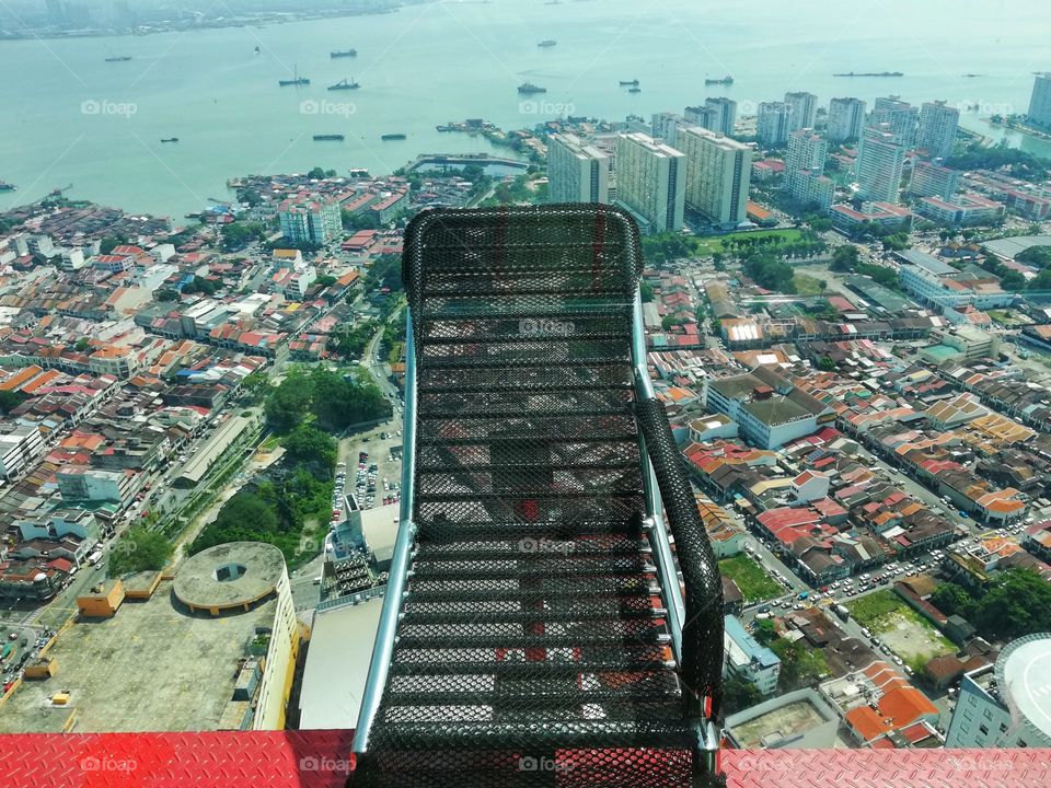 View of the Penang skyline in Malaysia and the chance to lie out on a deck chair to feel the adrenaline