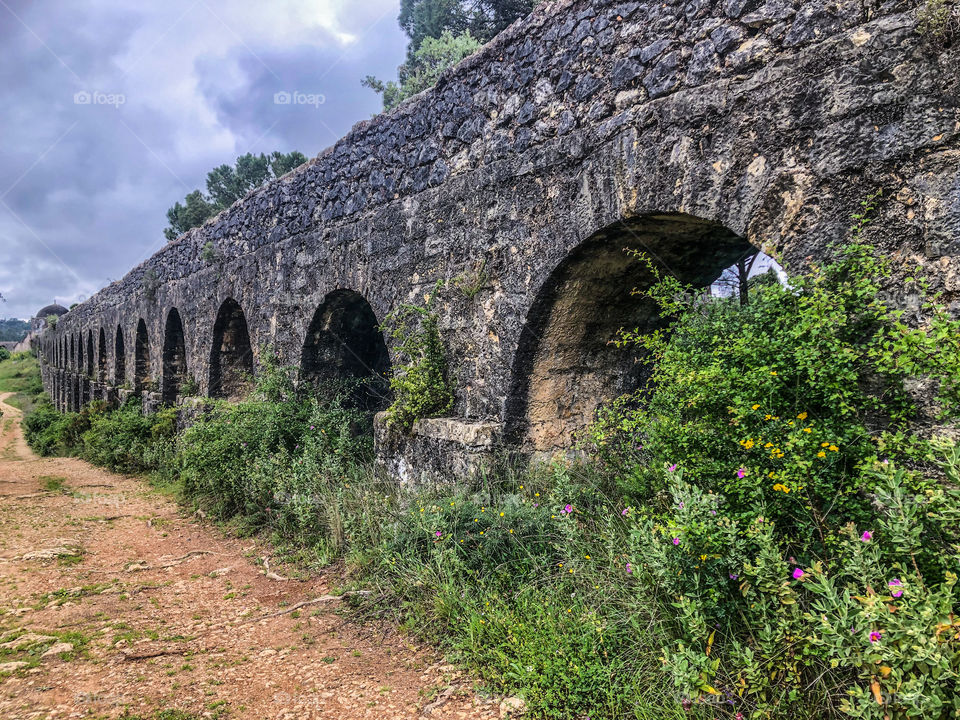 A portion of the 6 kilometre aqueduct of the Convento de Cristo built 1593-1614, Tomar, Portugal 2021