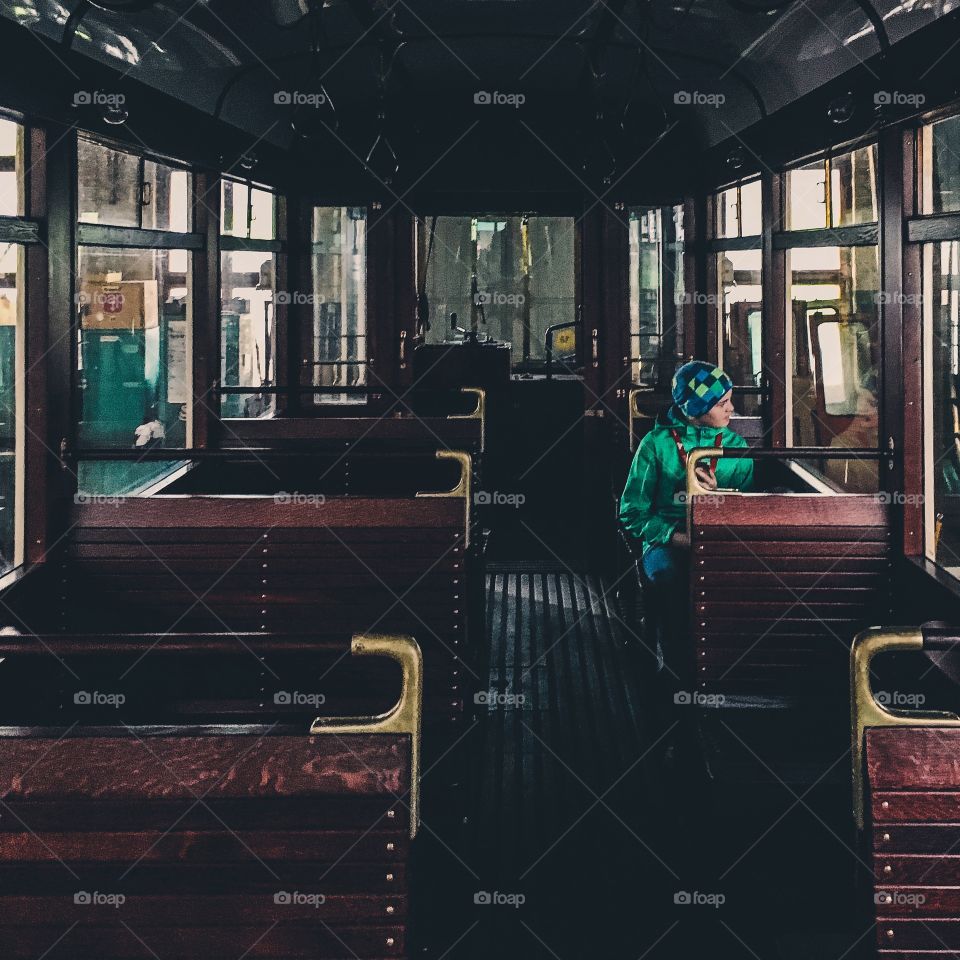 Young woman sitting in bus