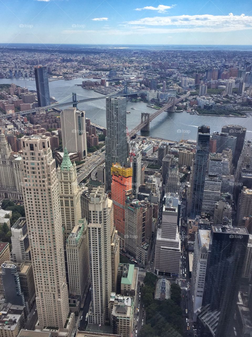 Standing on the top of Tower One, watching the Big Apple, it is so hard to grasp the full meaning of what New York is! Such an amazing place! It is like standing in the center of the planet!