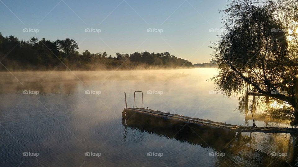 Misty jetty in the lake