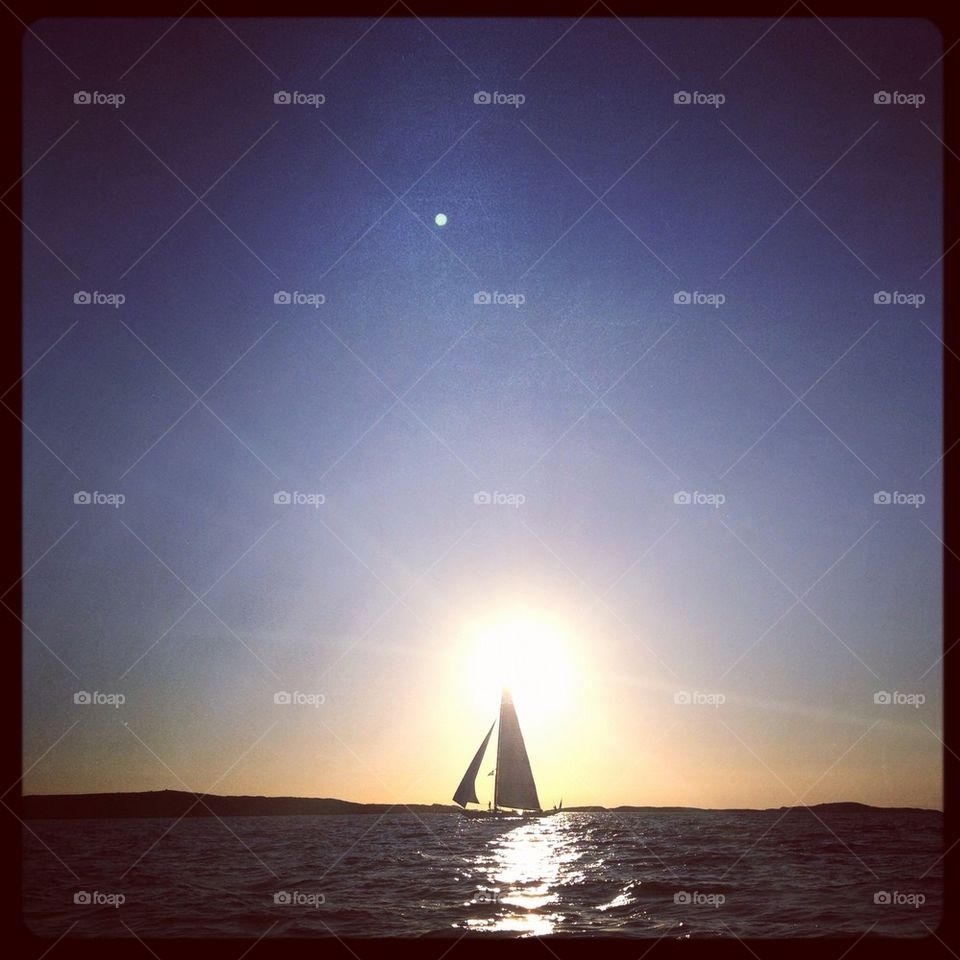 Sailboat in sunset