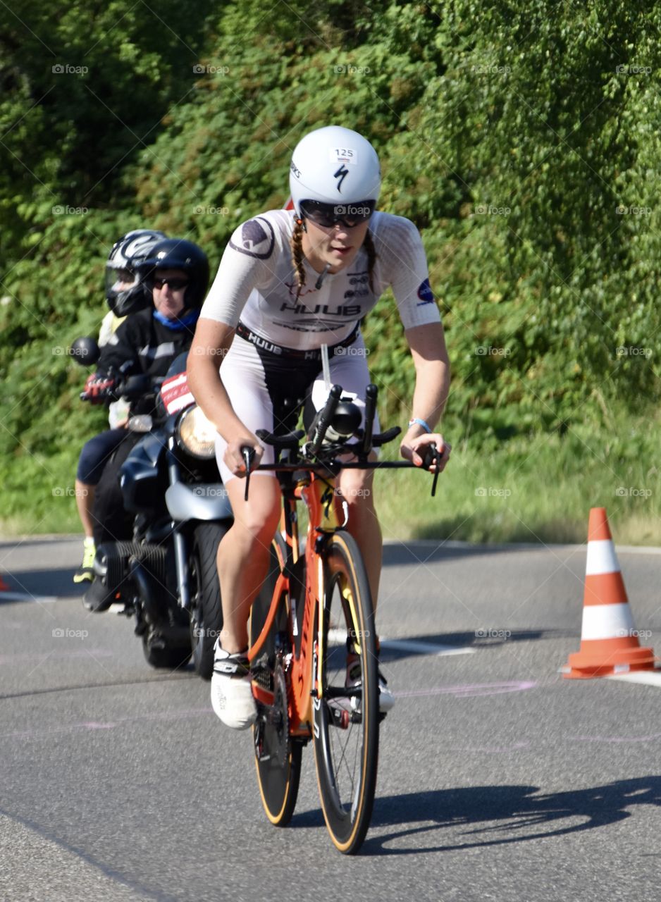 Lucy Charls riding uphill at Ironman Germany European Championships 