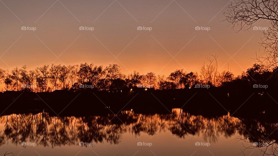 Sunset is now the colors of the sky represent Sunset, Twilight is now present and Total Refections of Landscape are Mirrored from Lake Waters. 