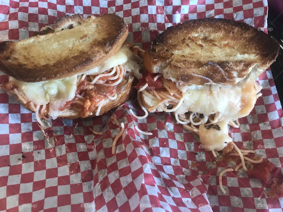 Yummy spaghetti and mozzarella cheese toasted sandwich 