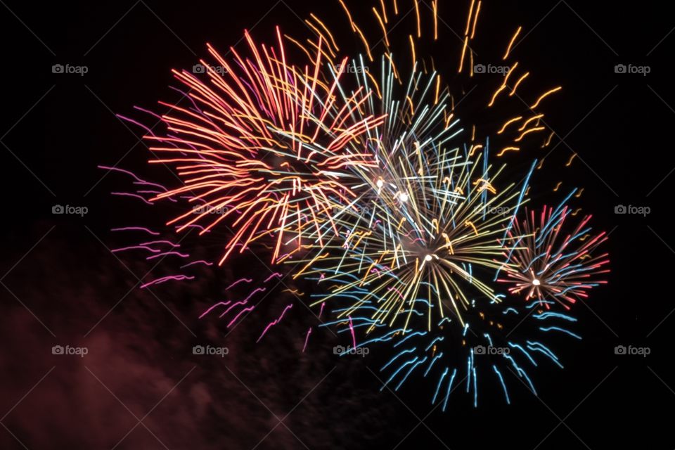 An array of colors in the grand finale of a firework show. 