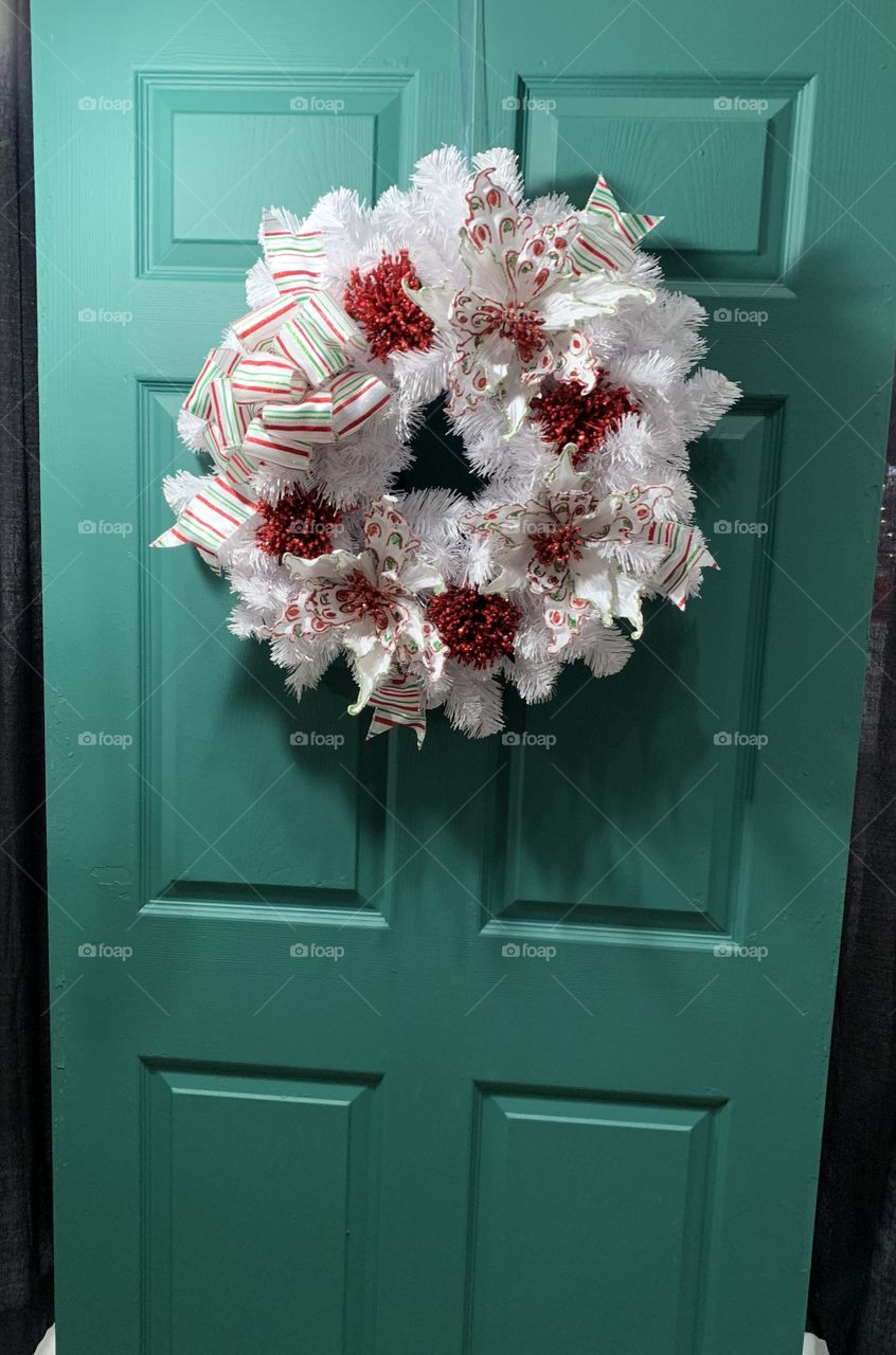 White Christmas Wreath on the Front Door  - Peppermint ribbon, red berries, white wreath