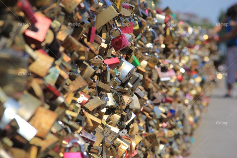 This photos is especially cool because it's one of the last professional photos of the lock bridge in Paris, France. 
A week after I took this photo, the locks were all cut off due to the weight causing the bridge to nearly collapse. 