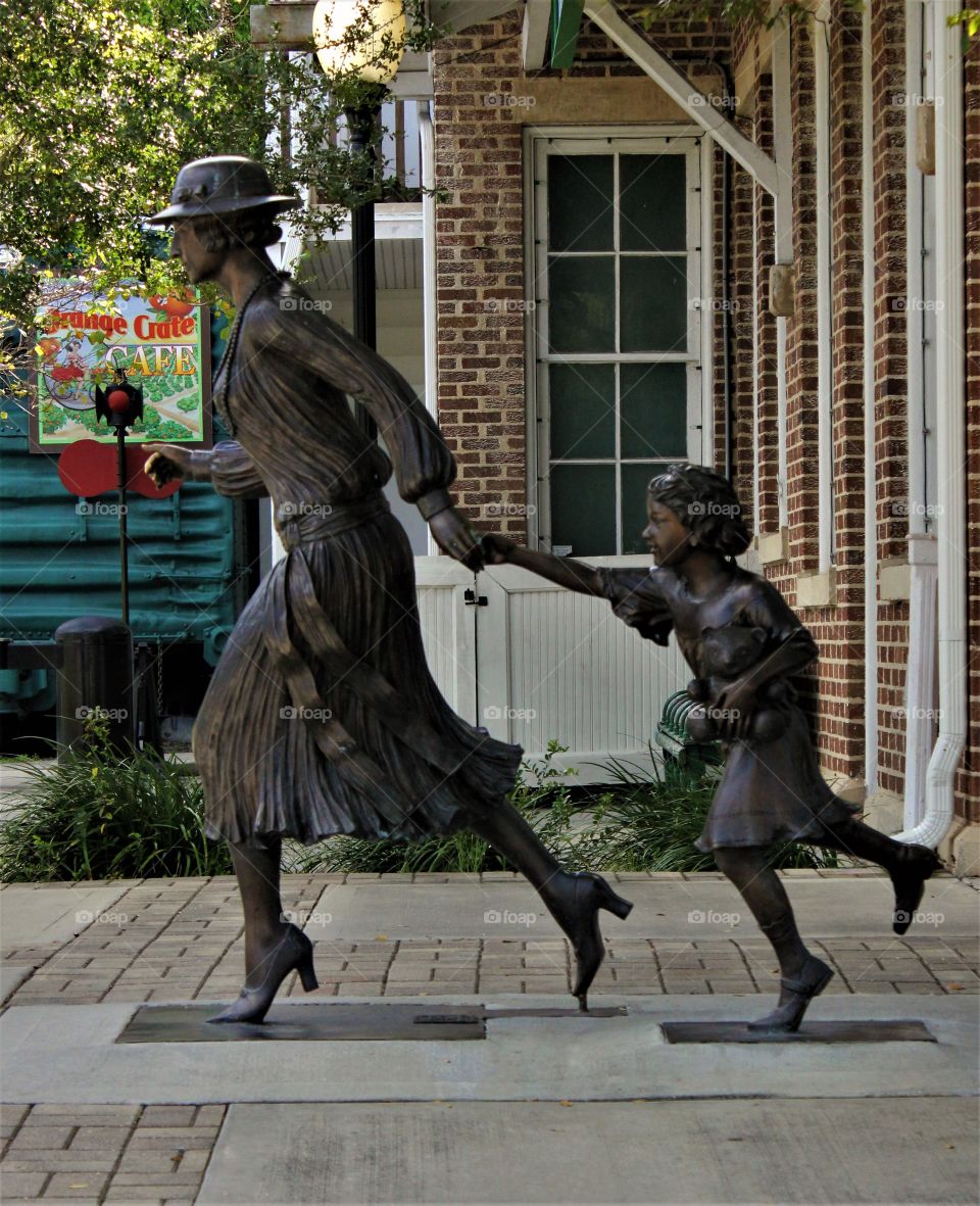Woman and Child Running