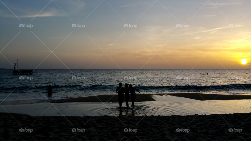 sunset with family silhouette