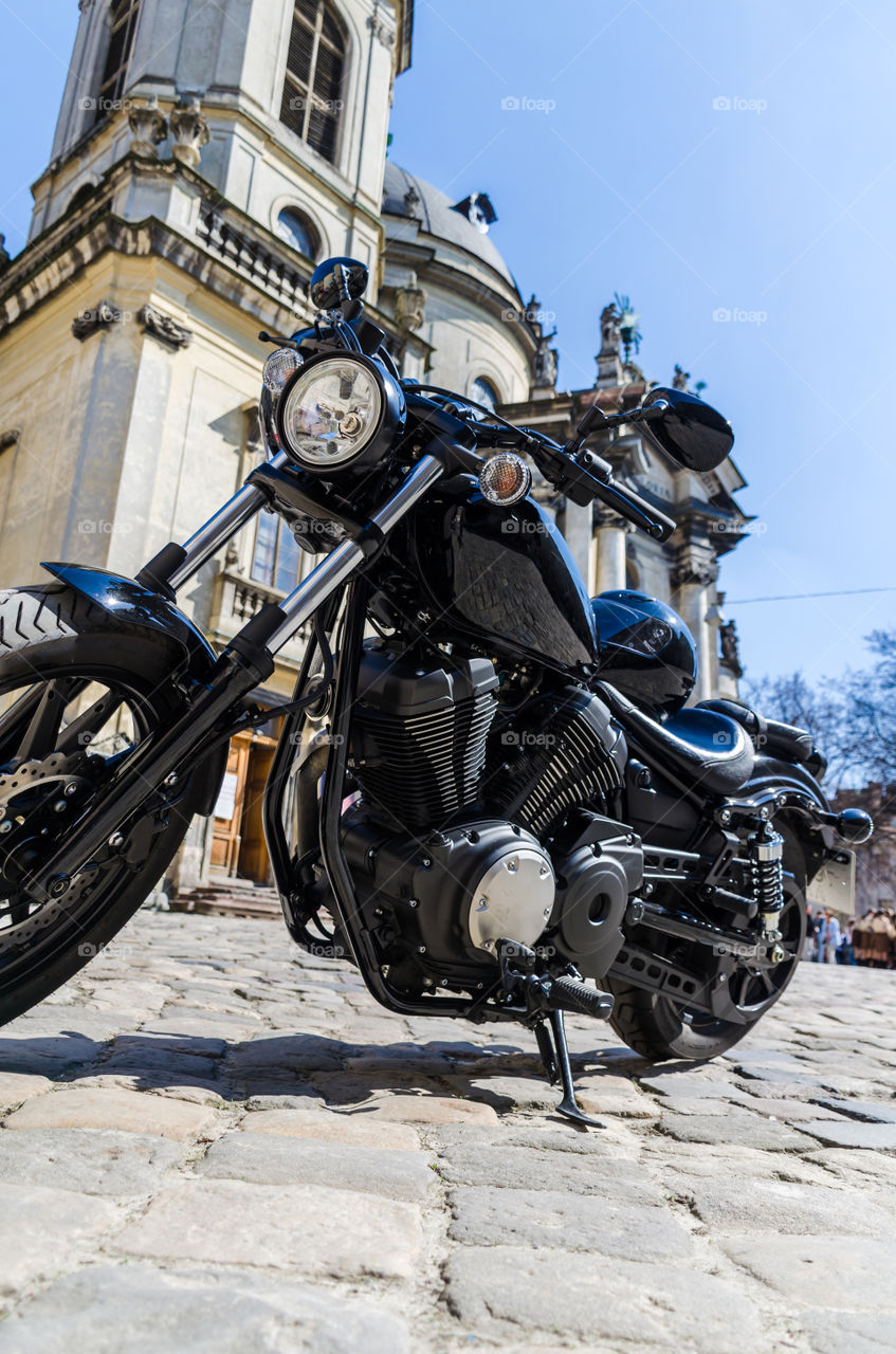 Black classic motorcycle on the street