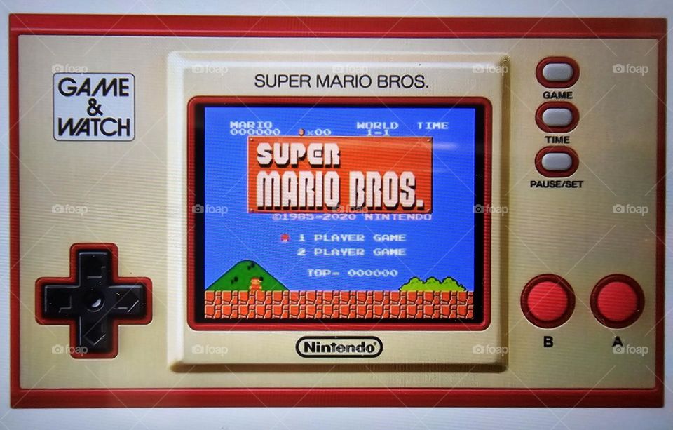 Old school Nintendo hand held Super Mario Bros