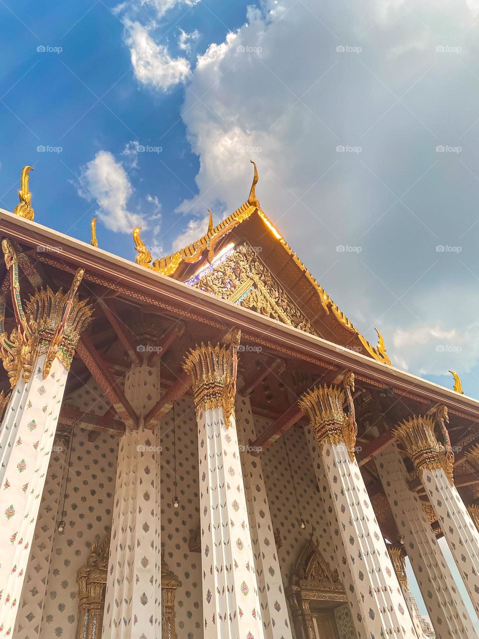 Beautiful golden temple with incredible decorated pillars 