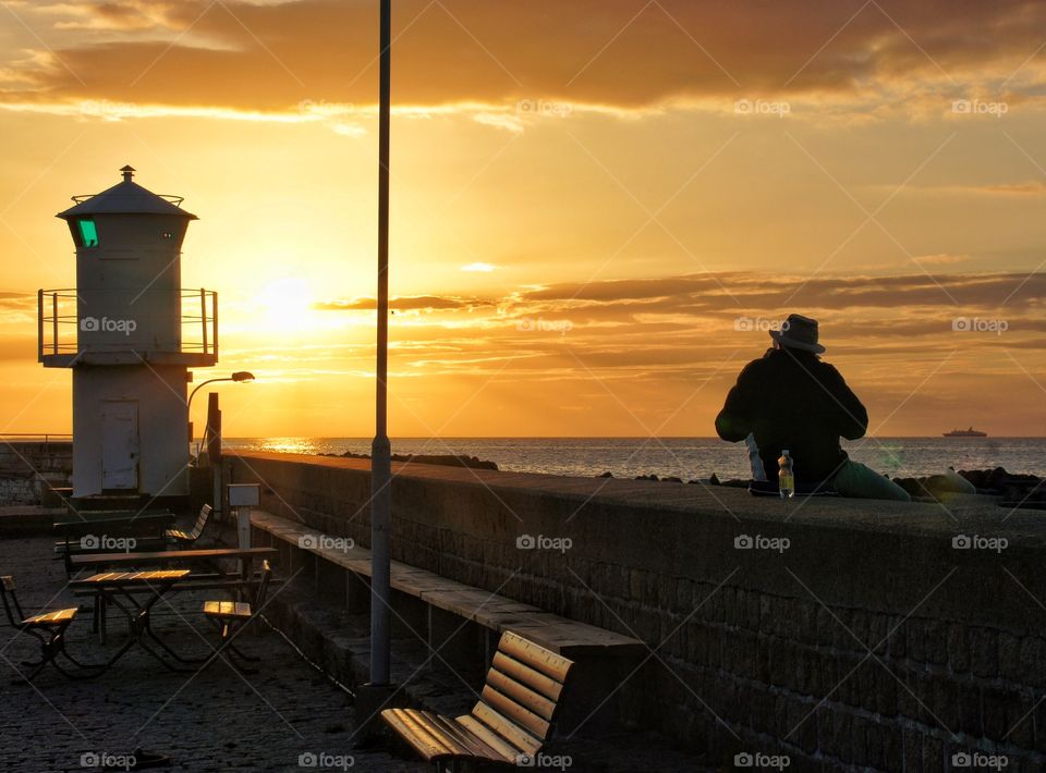 Man on a wall