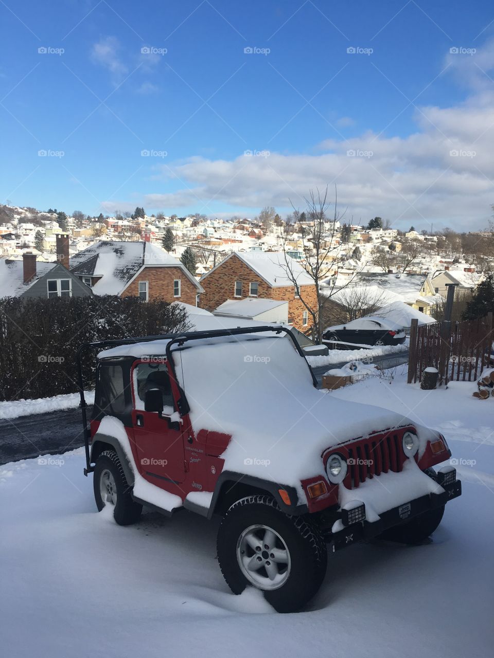 Snow covered Jeep 