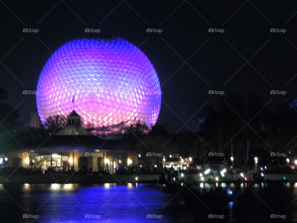 Spaceship Earth shines brightly at the entrance to EPCOT at the Walt Disney World Resort in Orlando, Florida.