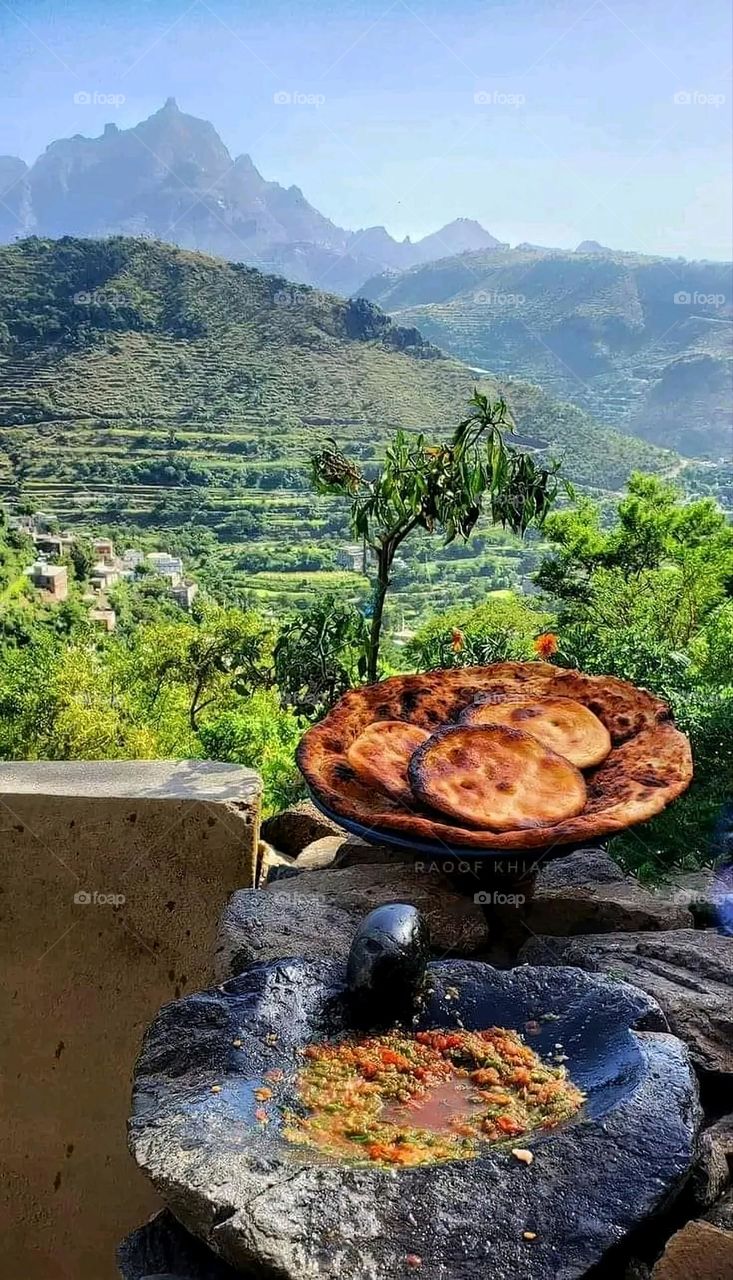 Glory be to God, the magnificent and picturesque view and the natural green trees are a view that is nothing more wonderful than it