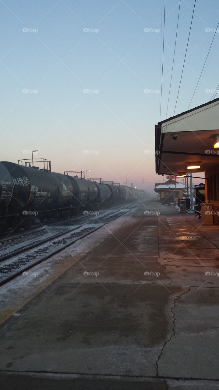 Snow dusted train station.