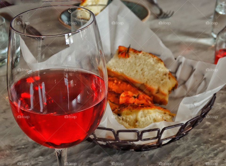 Red Wine With Bread. Wine Glass With Cabernet Sauvignon And Artisanal Bread
