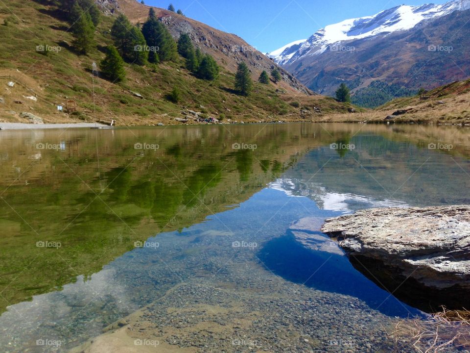 Switzerland - reflection lake - mountains 