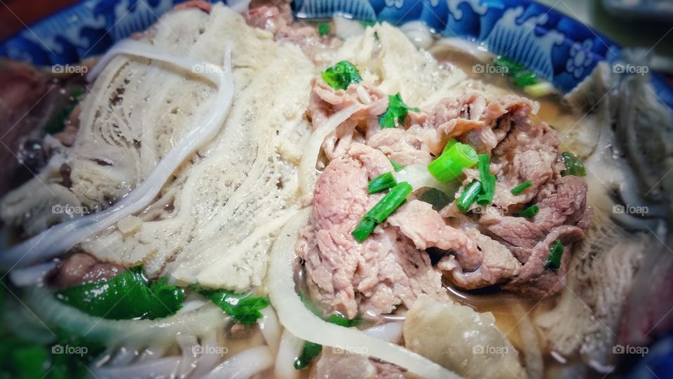 Vietnamese beef special noodle soup, Pho Dac Biet. A common breakfast meal that contains beef, tripe, tendons, rice noodle and fragrant soup base.