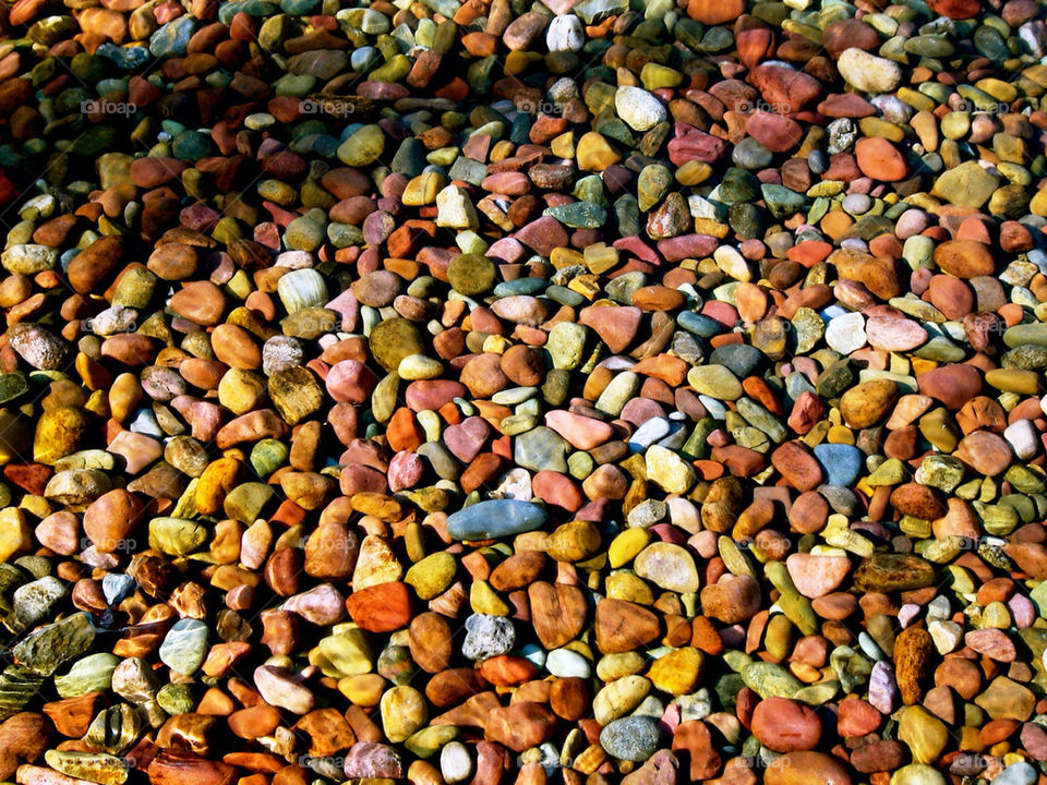 background water rocks pebbles by refocusphoto