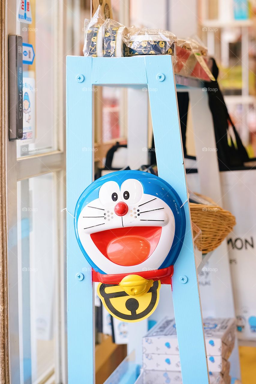 Kawaguchiko, Japan - May 14, 2018 : A photo of Doraemon mask selling at the souvenir shop nearby Kawaguchi lake. Doraemon is an all time famous Japanese cartoon character. Editorial use only.