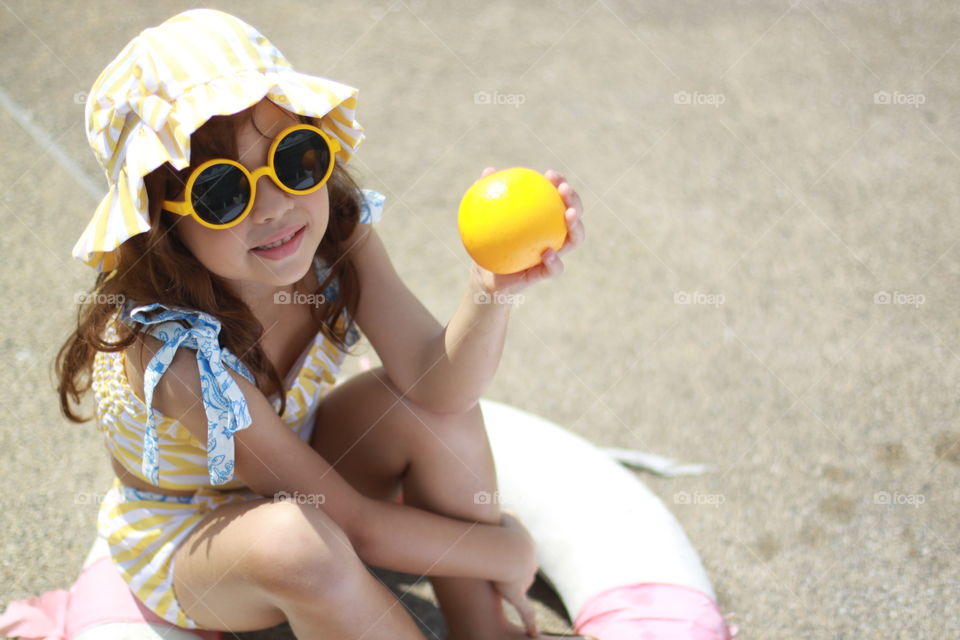 yellow girl. summer swimming suit