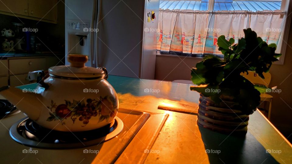 sunrise light flooding into the kitchen