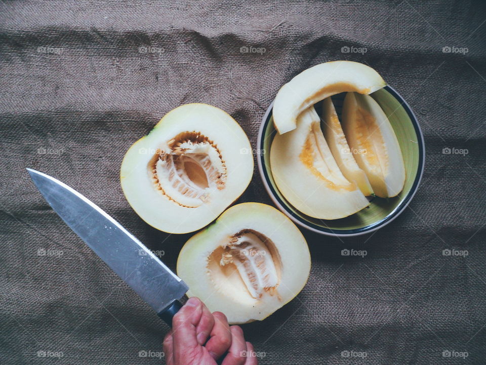 sliced ​​melon lie on the table