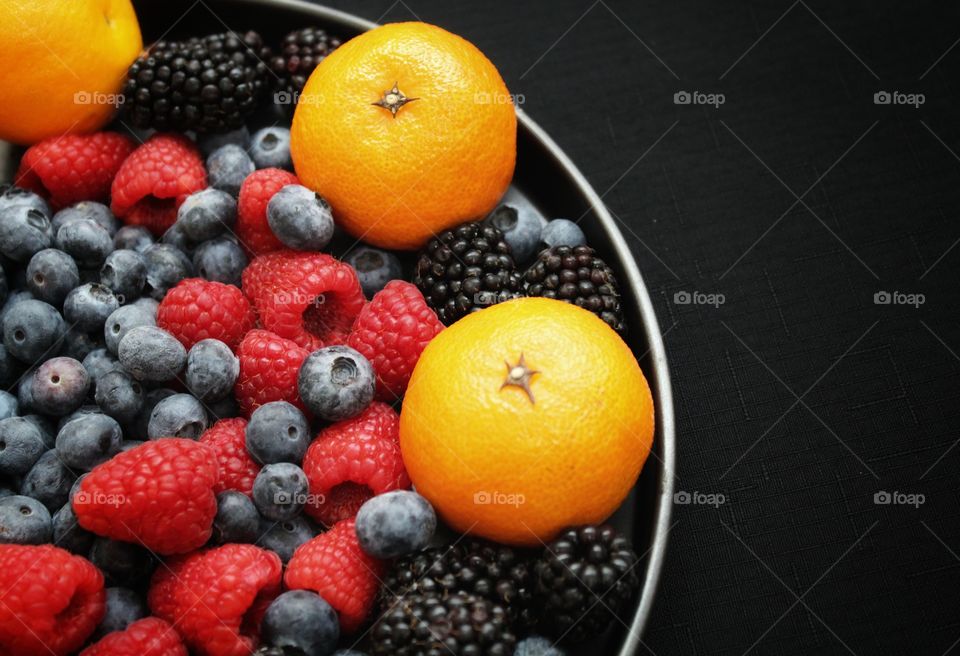 colorful fruits with black background