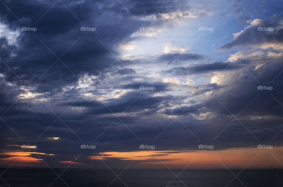 A beautiful sunrise off the horizon of the Absecon bay in Atlantic city lights up the morning sky.