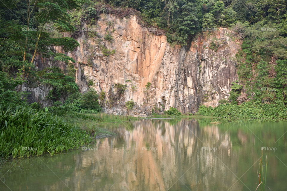 nice reflection of quarry wall on the water