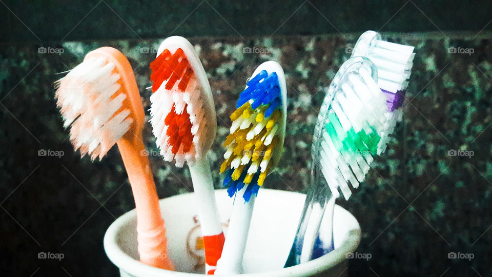 Naturally, they are just toothbrushes. But if you look at it in a different thought, they represent the family members who own each of them.