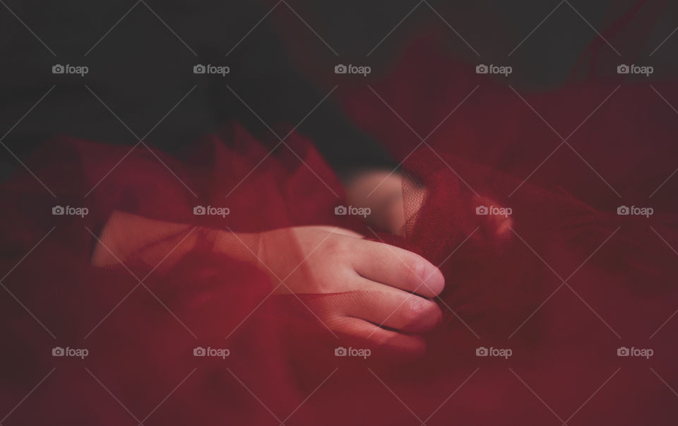 Close-up of women in red dress