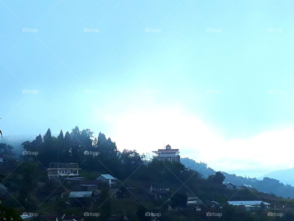 Beautiful view of highland residence in Ukhrul,Manipur, india. The fog and clouds add the extra beauty.