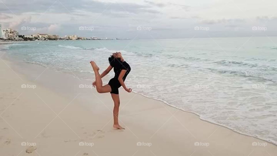 stretching on the beach.