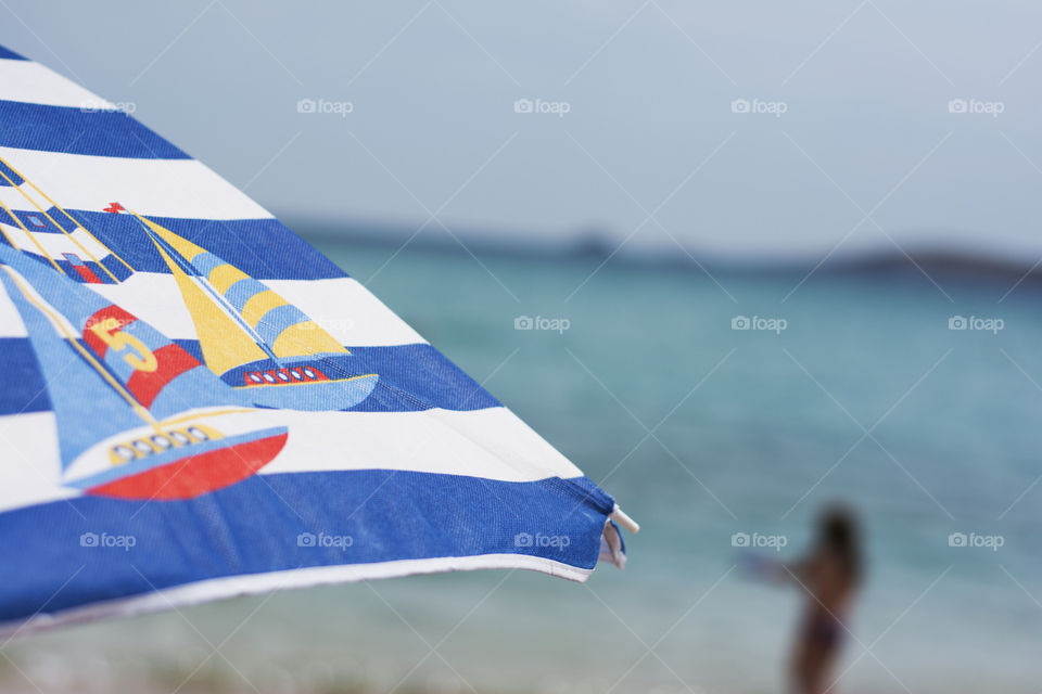 umbrella on beach. closeup of colorful umbrella at beach