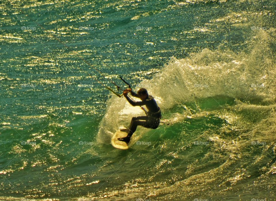 Big wave Surfing. Parasurfer In California
