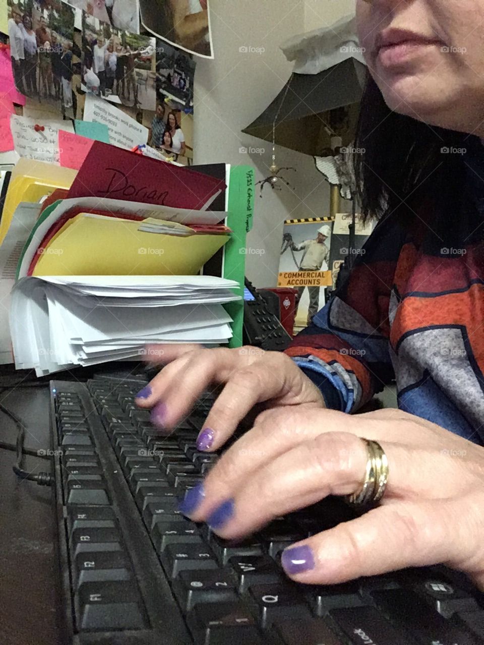 Working, typing, data entry on a computer 