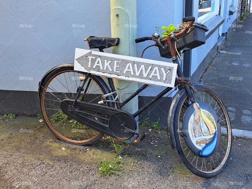 bike advertising a take away food shop