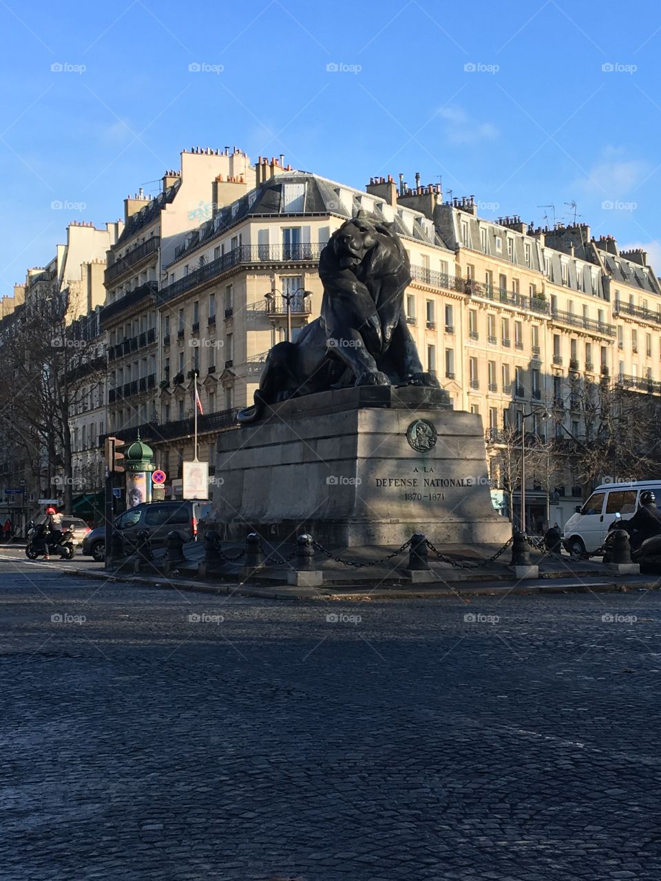 Statue outside of the entrance to the catacombs in Paris 