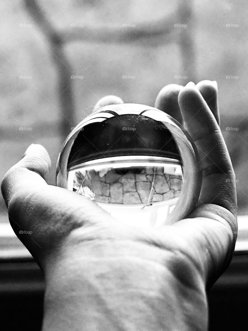 Hand with a crystal ball