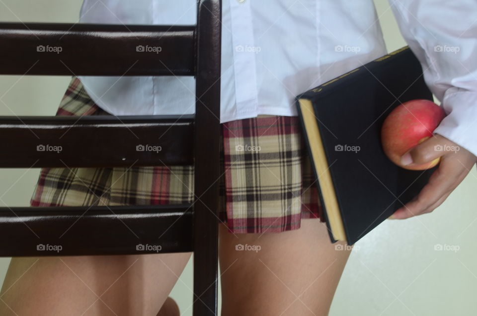 Student in a checkered skirt