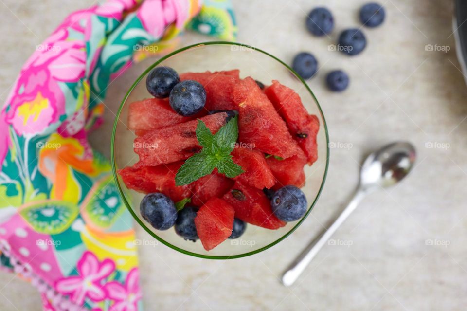 cup of watermelon with blueberries